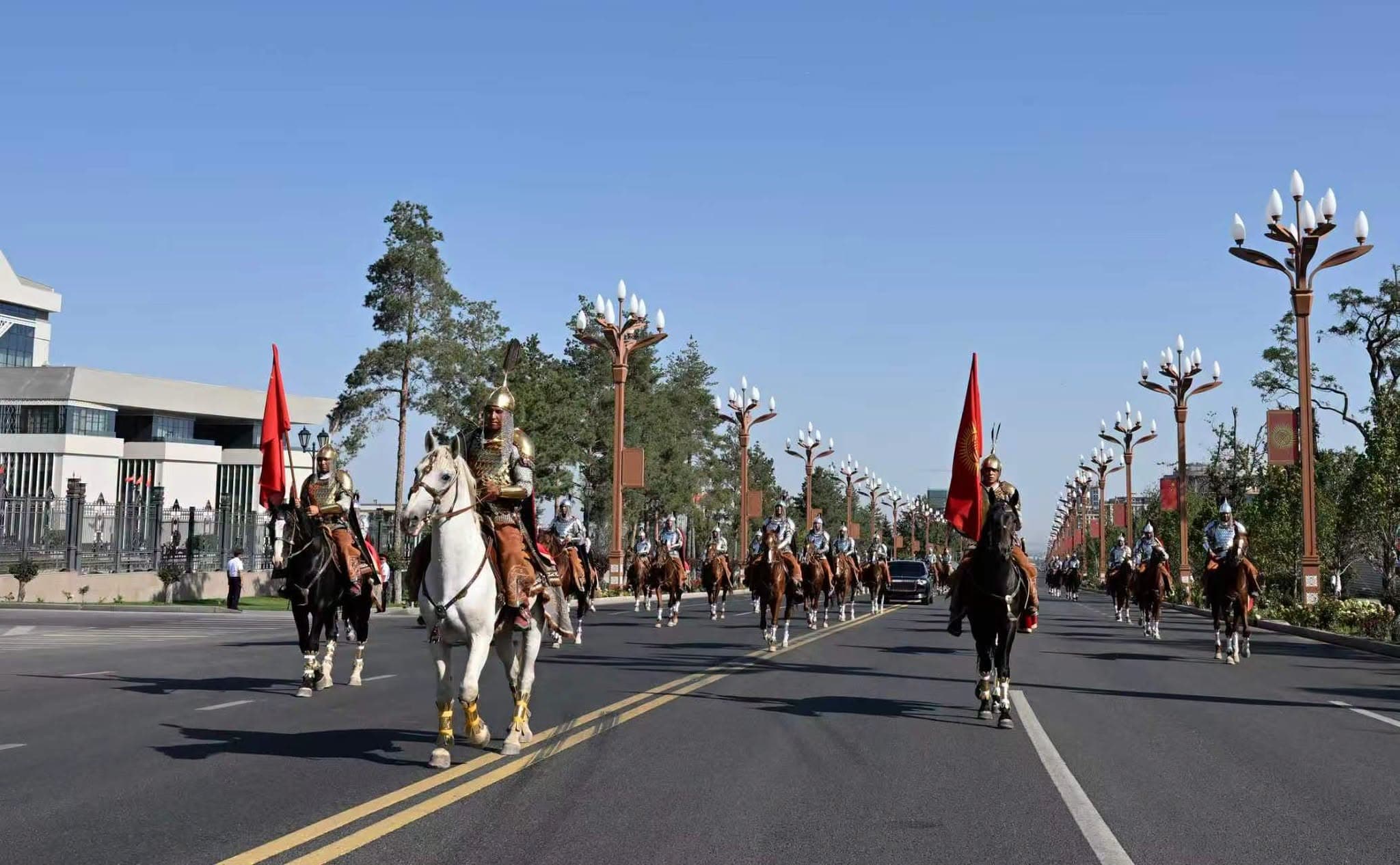 Kyrgyz honor guards on horseback welcome Chinese President Xi Jinping